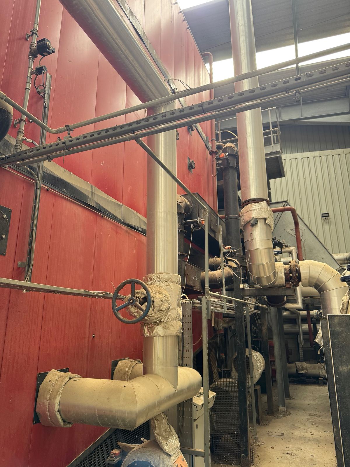 Waste-to-energy boiler with pipework and valves